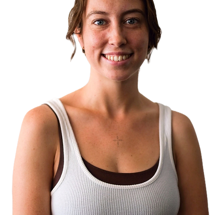 Smiling woman in white tank top, casual appearance.